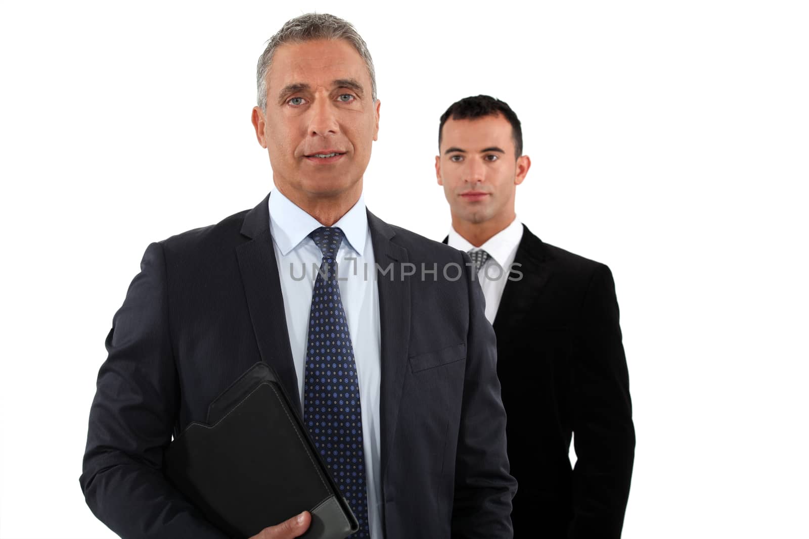 Businessman with his assistant by phovoir