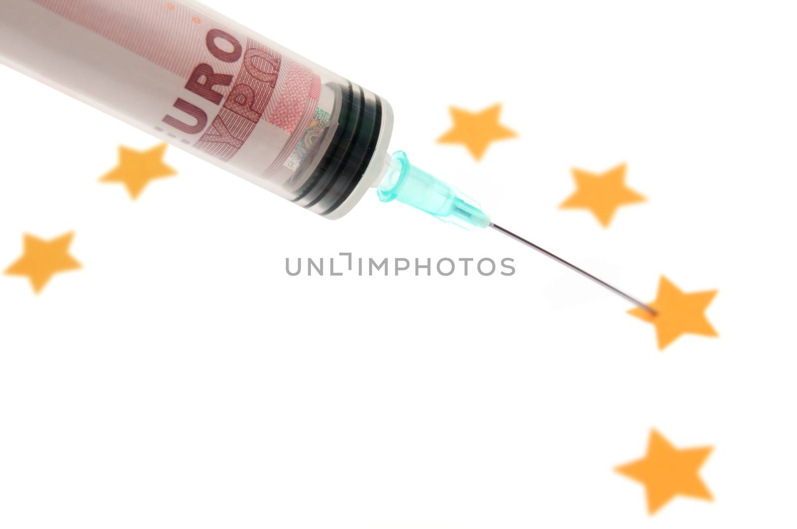 Injection needle containing euro banknotes pinpointing the euro stars symbolising a financial cash injection or bailout concept 