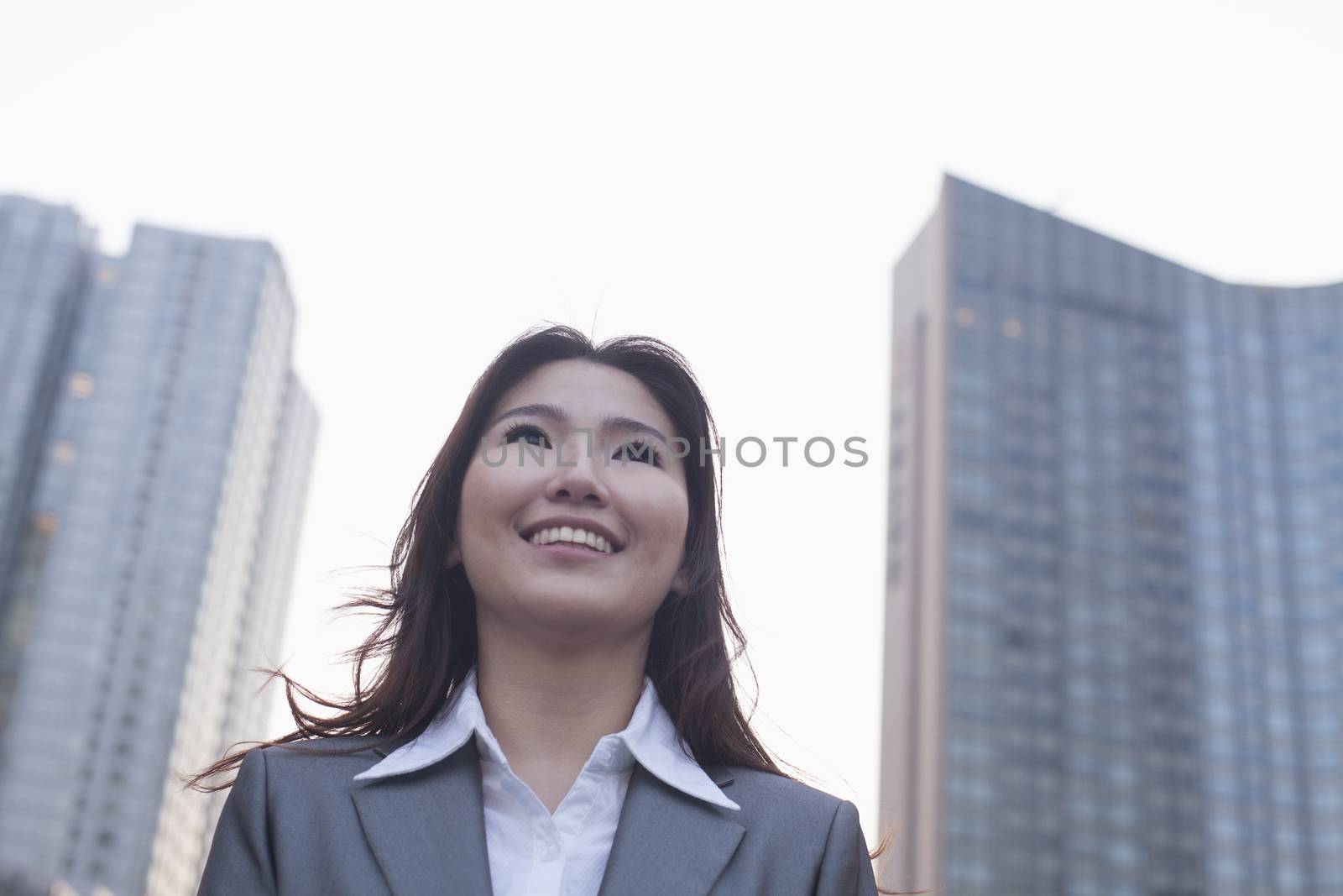 Portrait of young businesswoman outdoors, Beijing