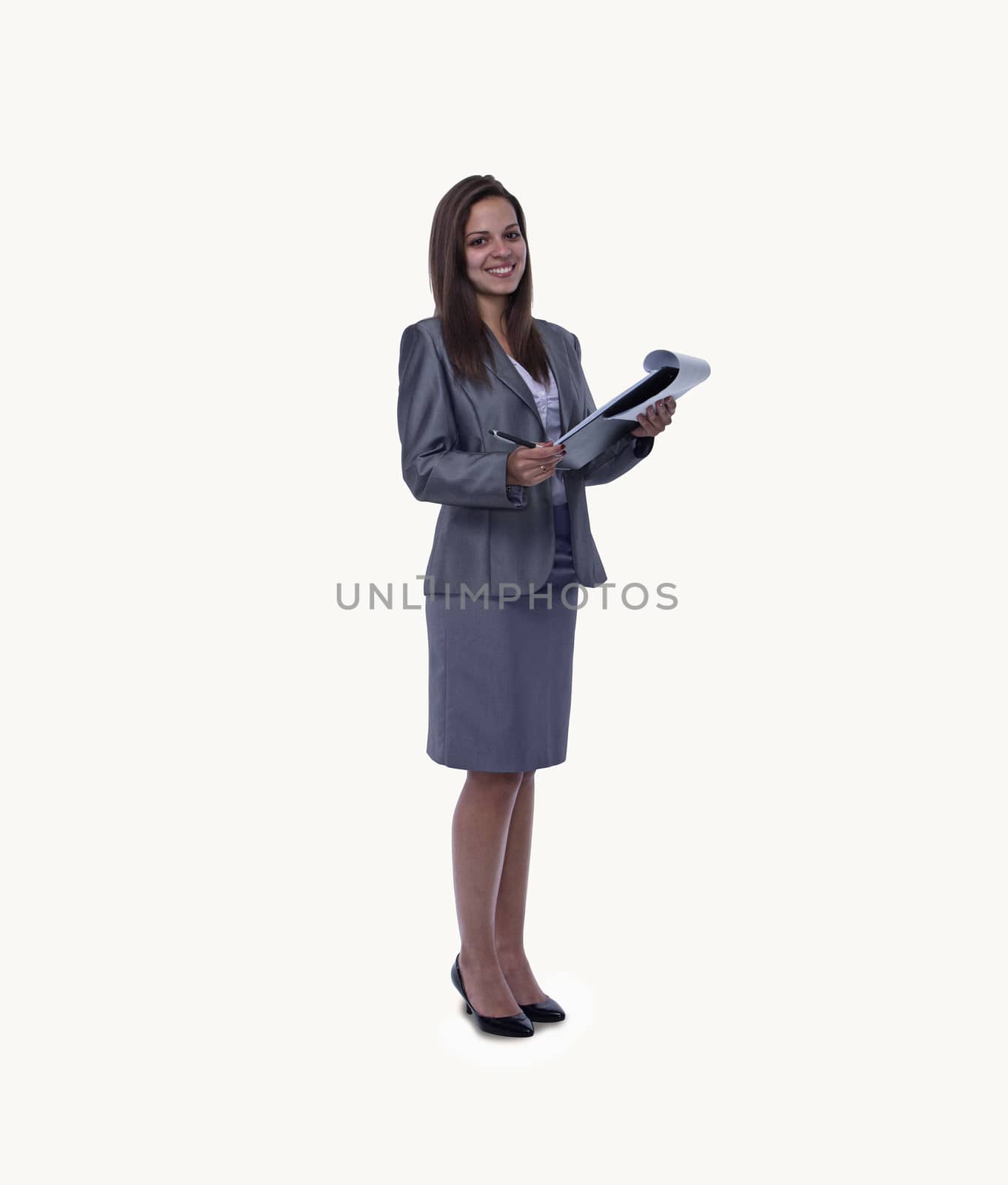 Portrait of smiling young businesswoman with an open note pad, full length, studio shot by XiXinXing