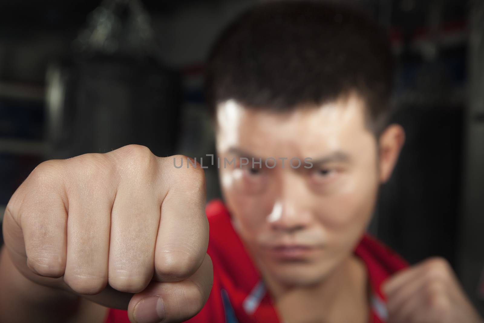 Close up of boxer throwing a punch at the camera