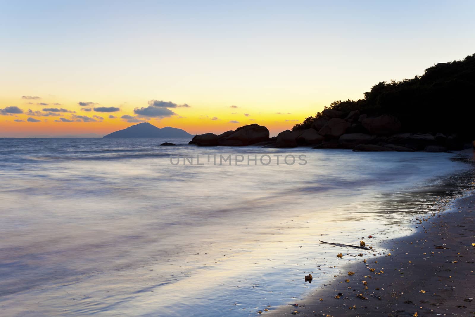 Sunset on the beach with beautiful sky by kawing921