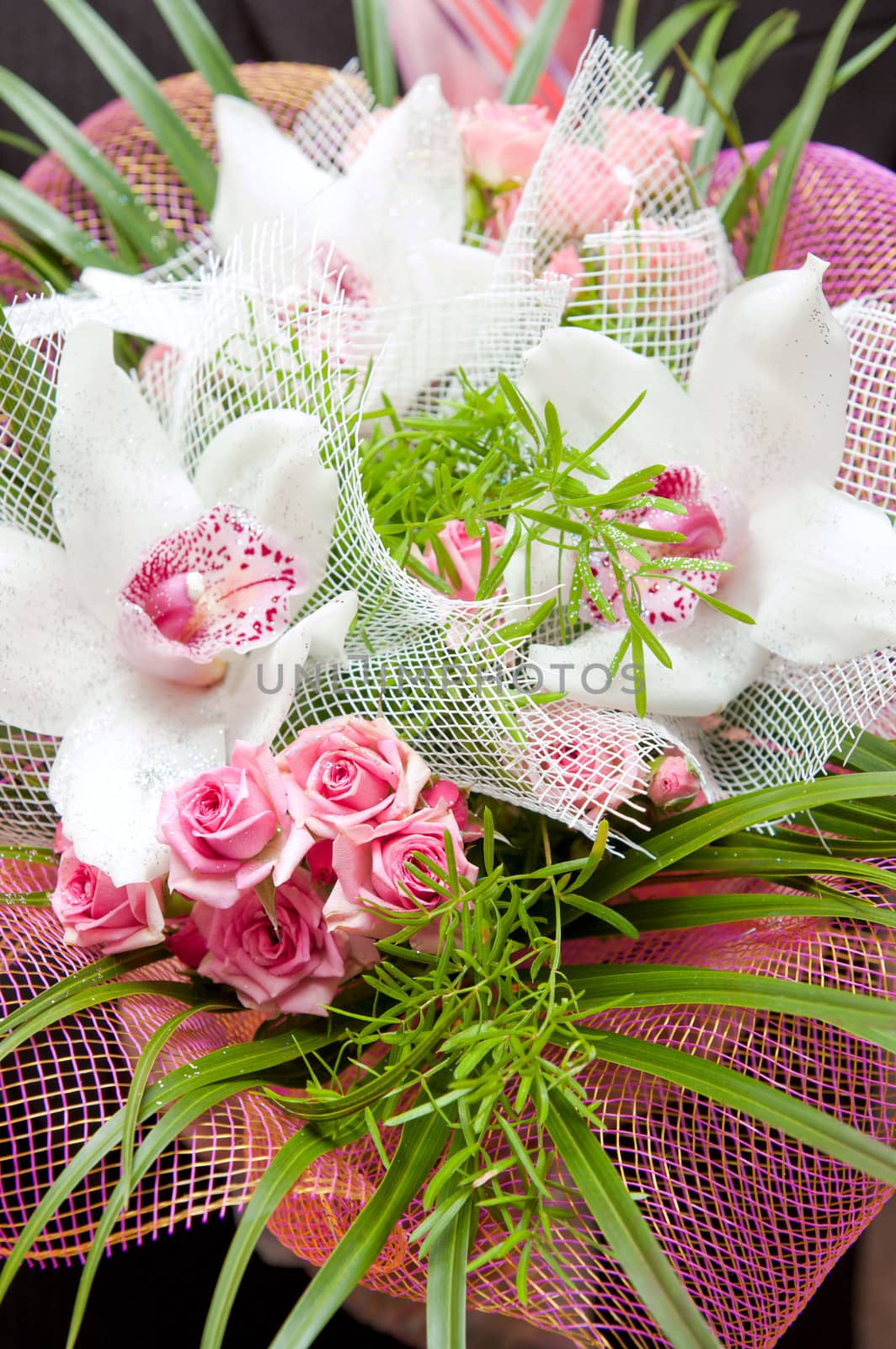 wedding bouquet with rose and orchid