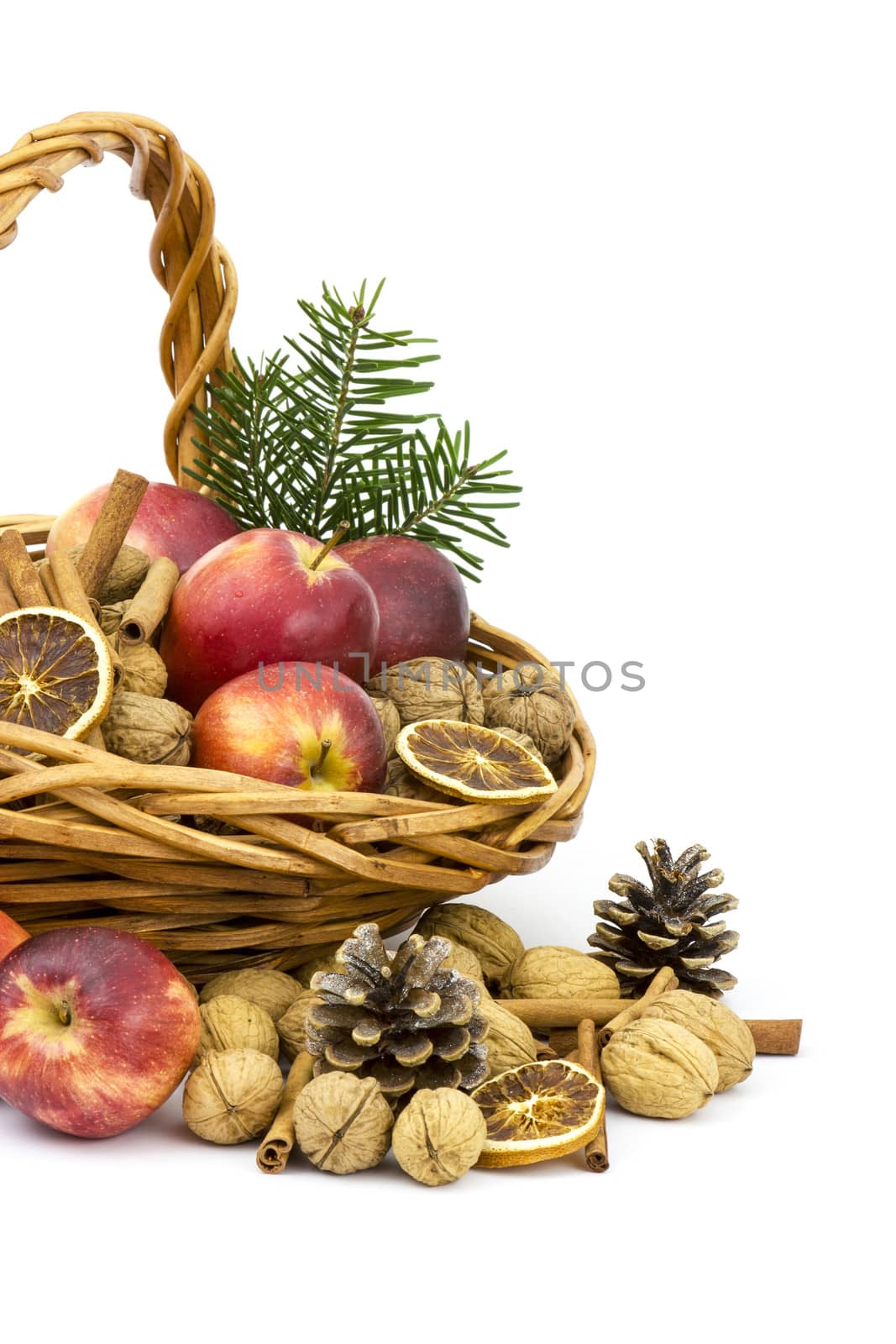 basket full of apples, nuts, cinnamon by miradrozdowski