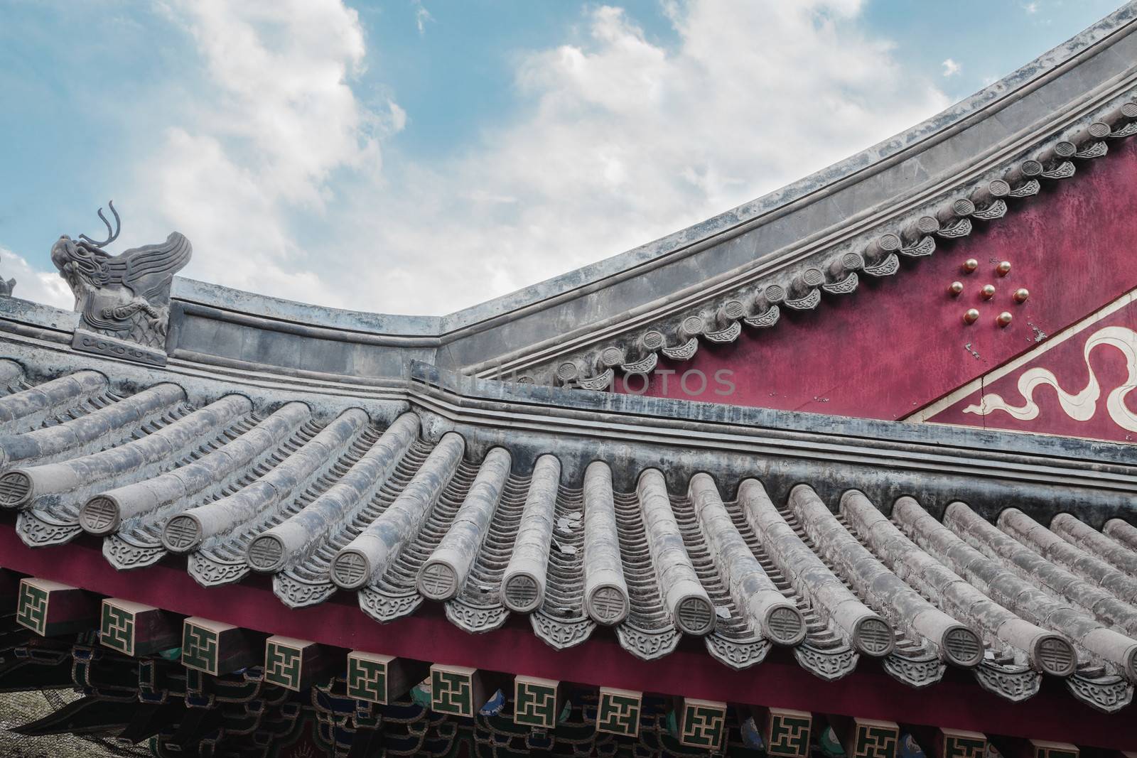 Close-up of ornate roof tiles on Chinese building. 