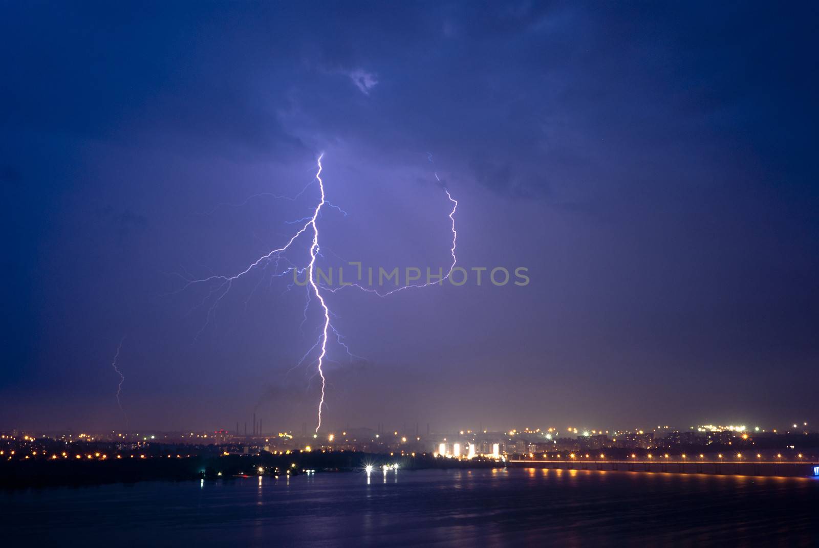 View of a lightning over city at night