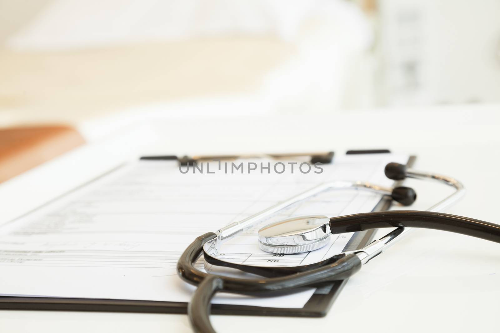 Close-Up of stethoscope and medical chart by XiXinXing