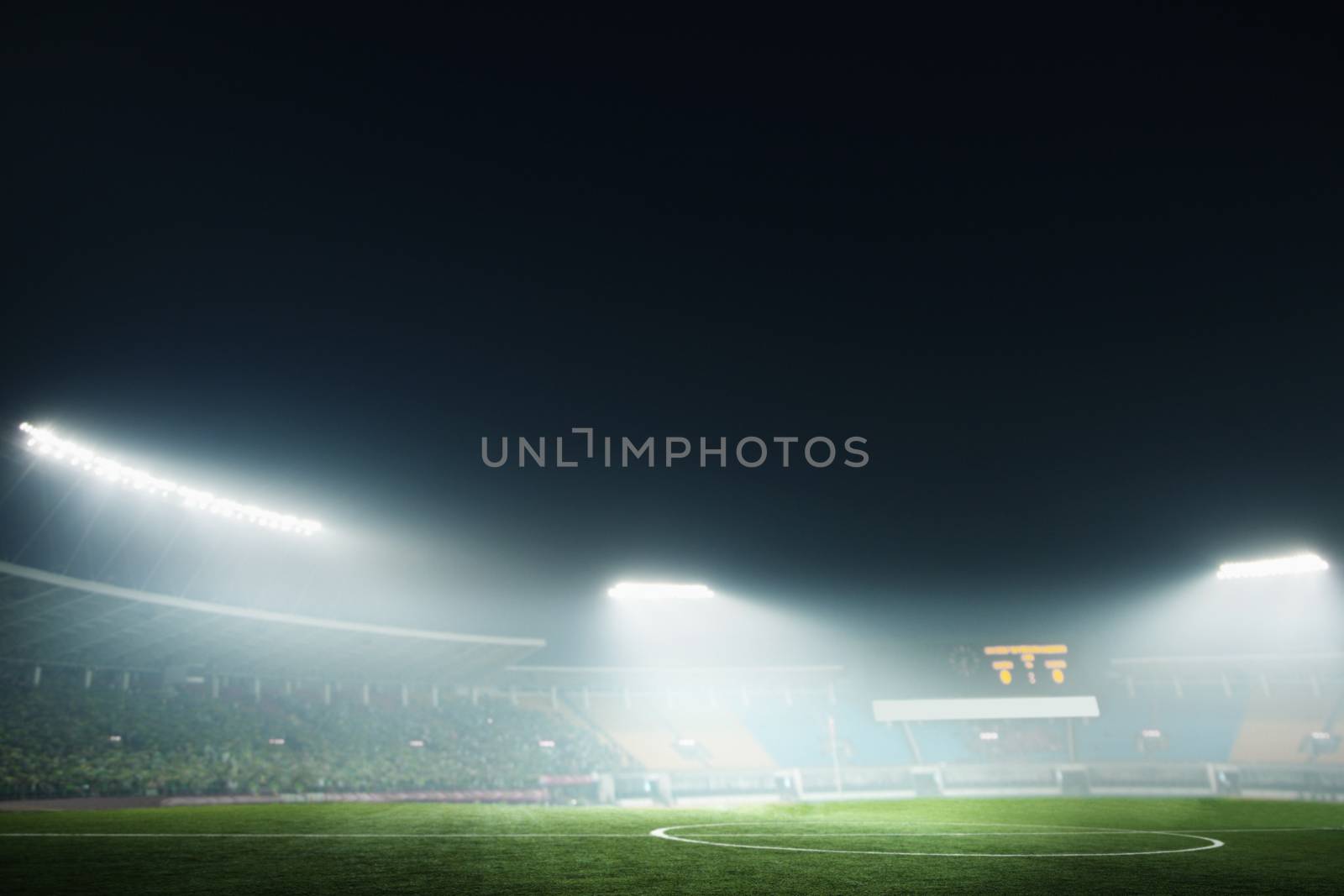 Digital coposit of soccer field and night sky