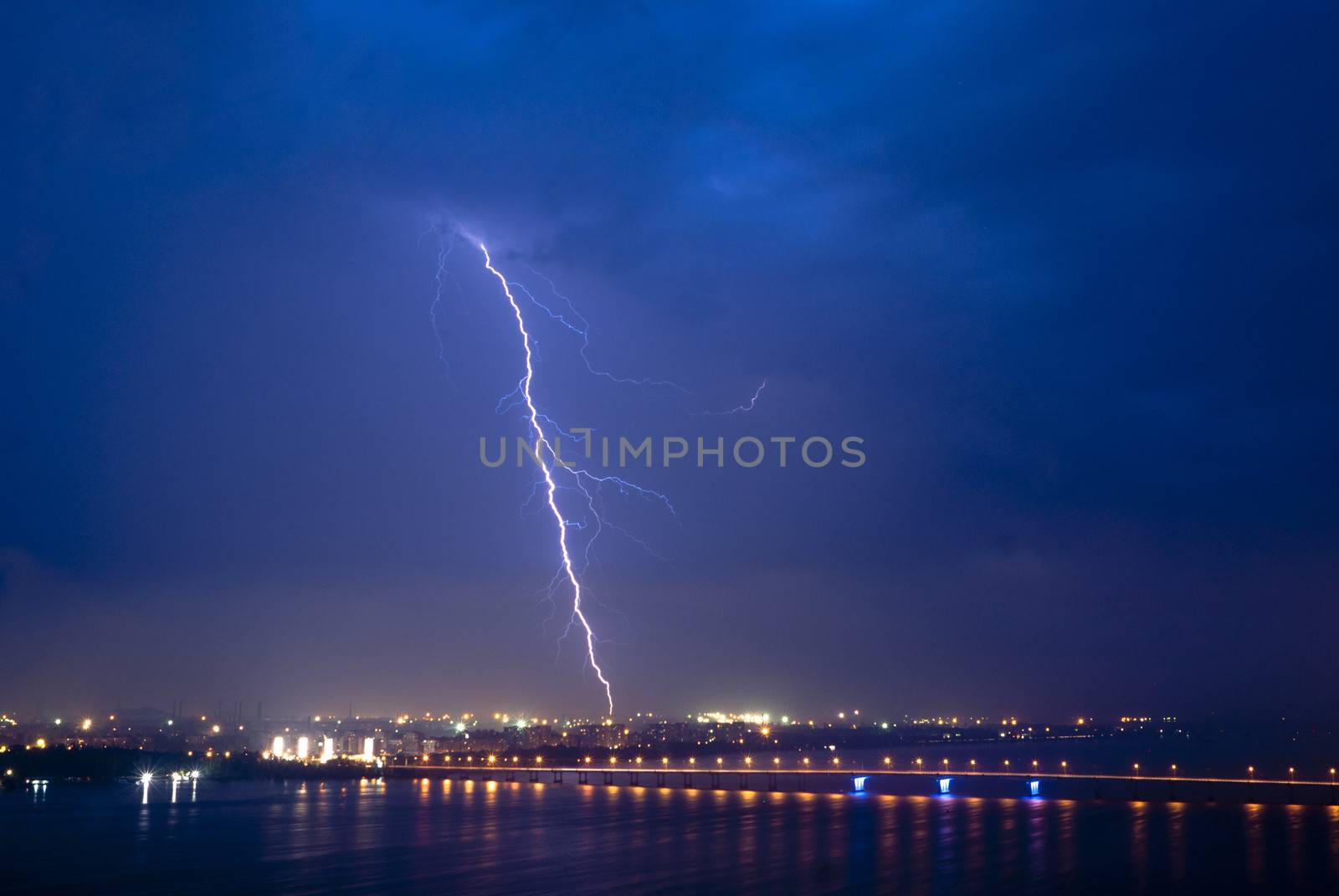 View of a lightning over city at night