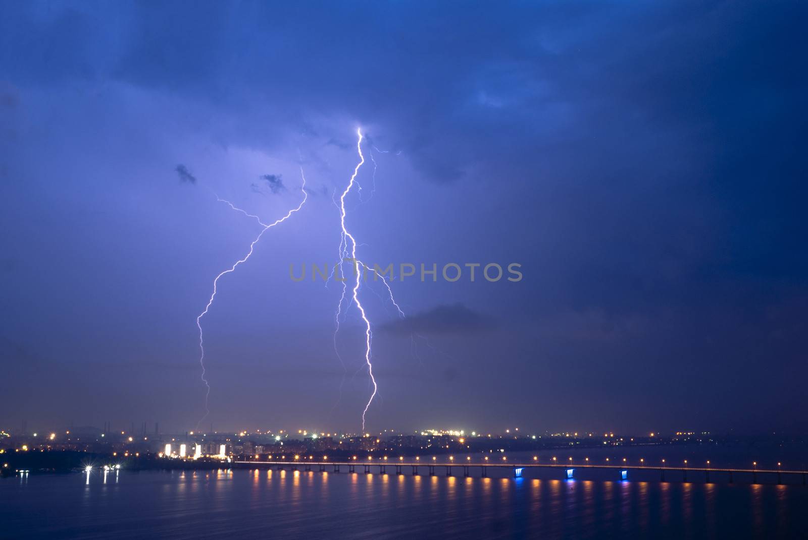 View of a lightning over city at night