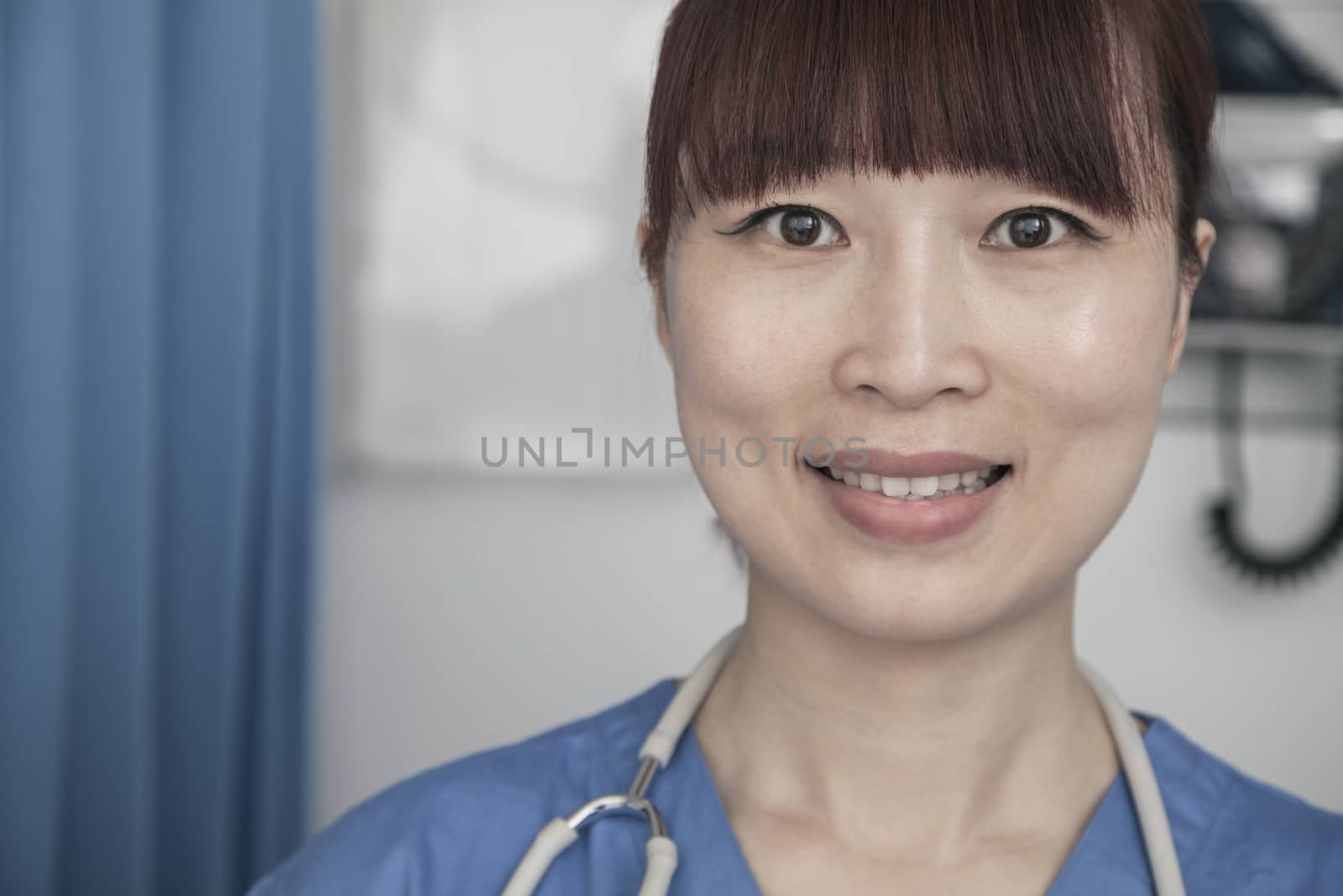 Portrait of smiling female doctor  by XiXinXing