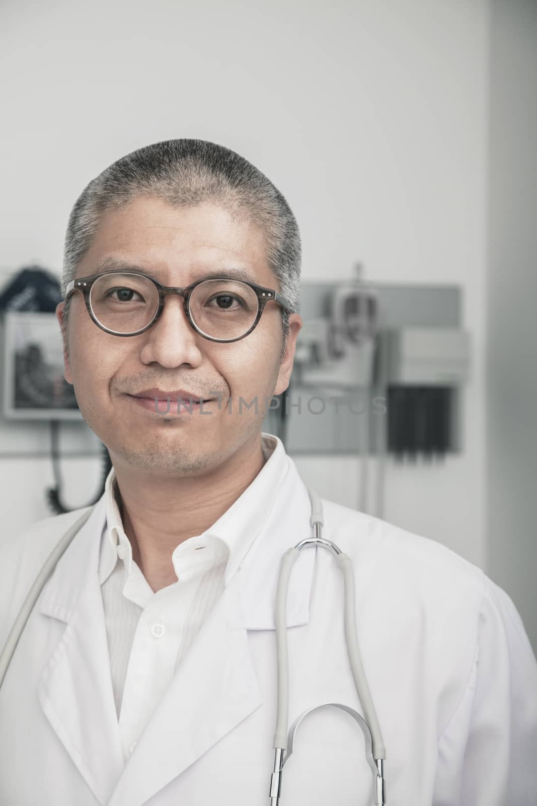 Portrait of smiling doctor wearing glasses