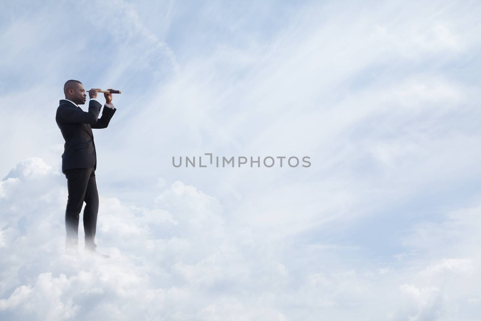 Young businessman looking through telescope in a dreamlike cloud world