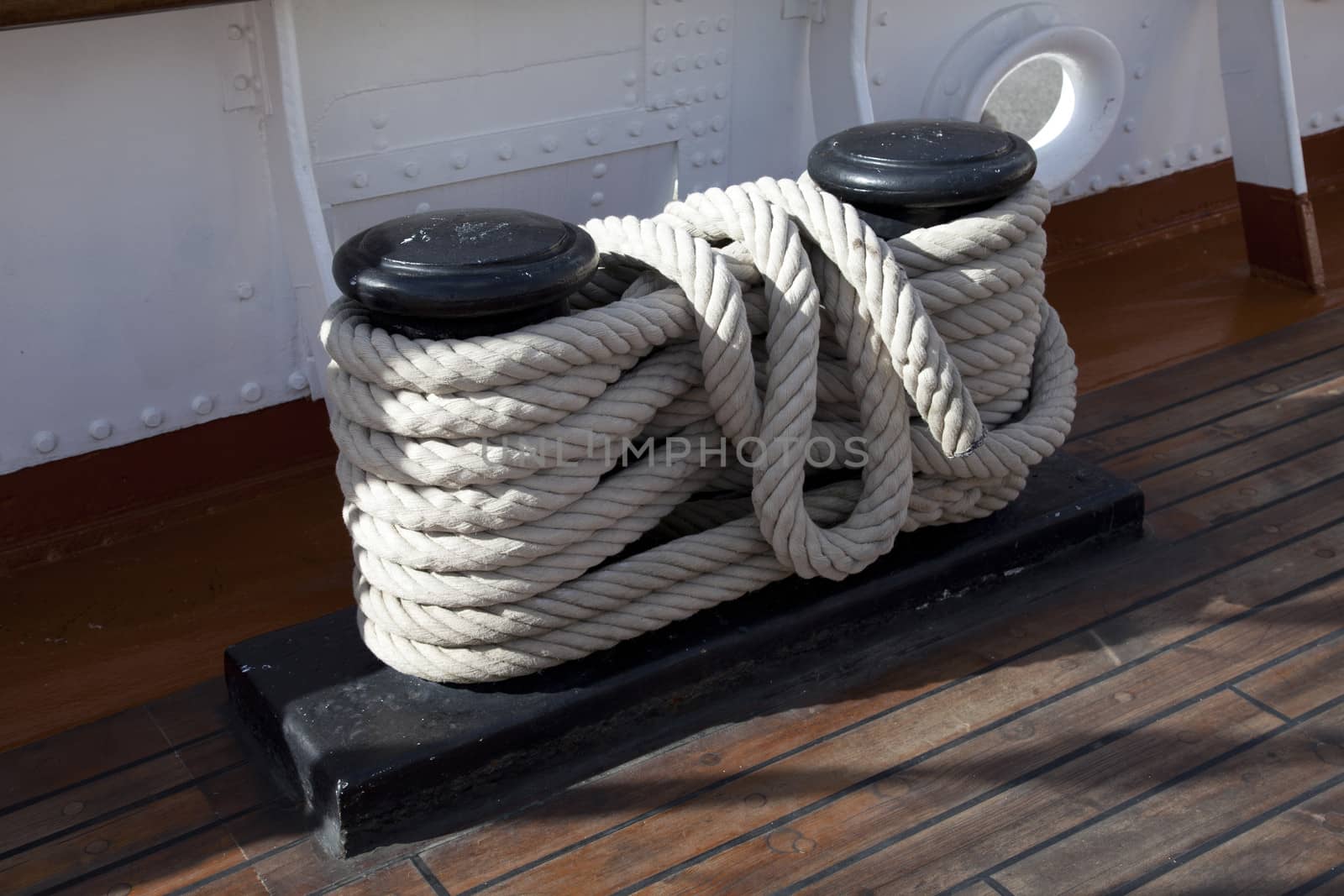 Sailboat wooden marine rigs and ropes. Nautical traditional tackle 
