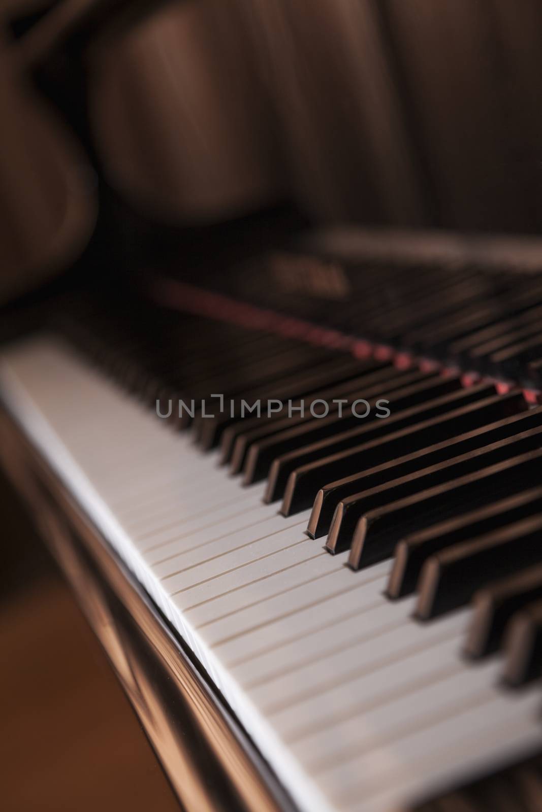 Close-up of piano and piano keys by XiXinXing
