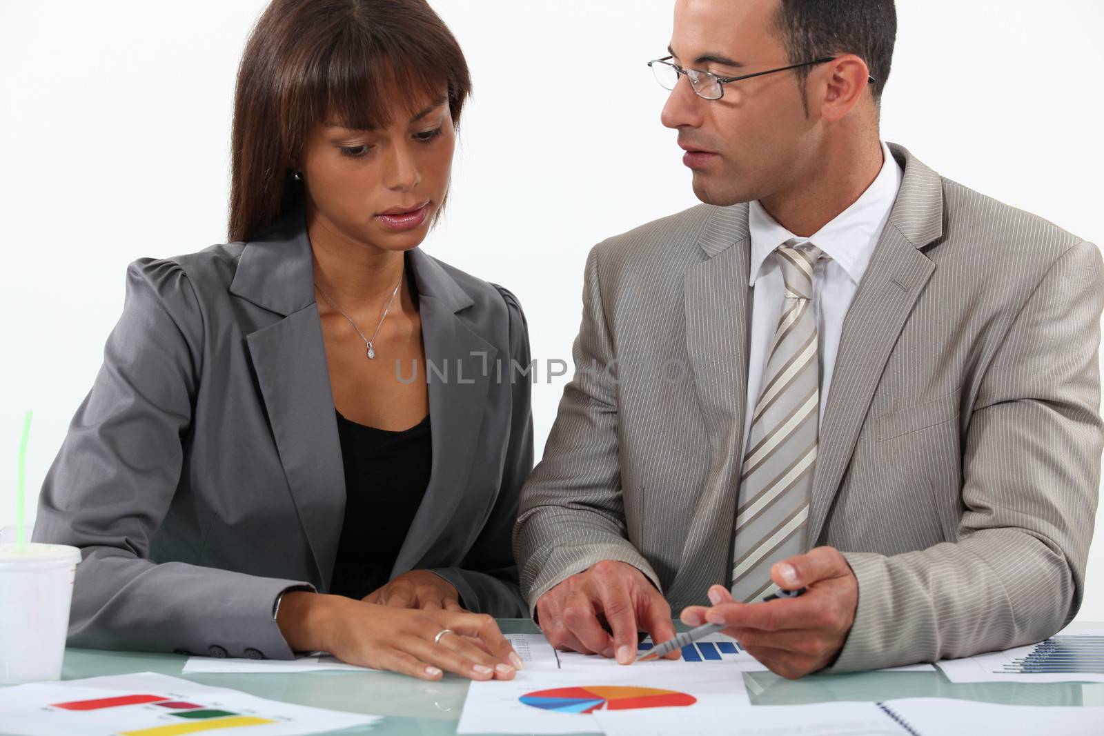 businessman displaying pie chart