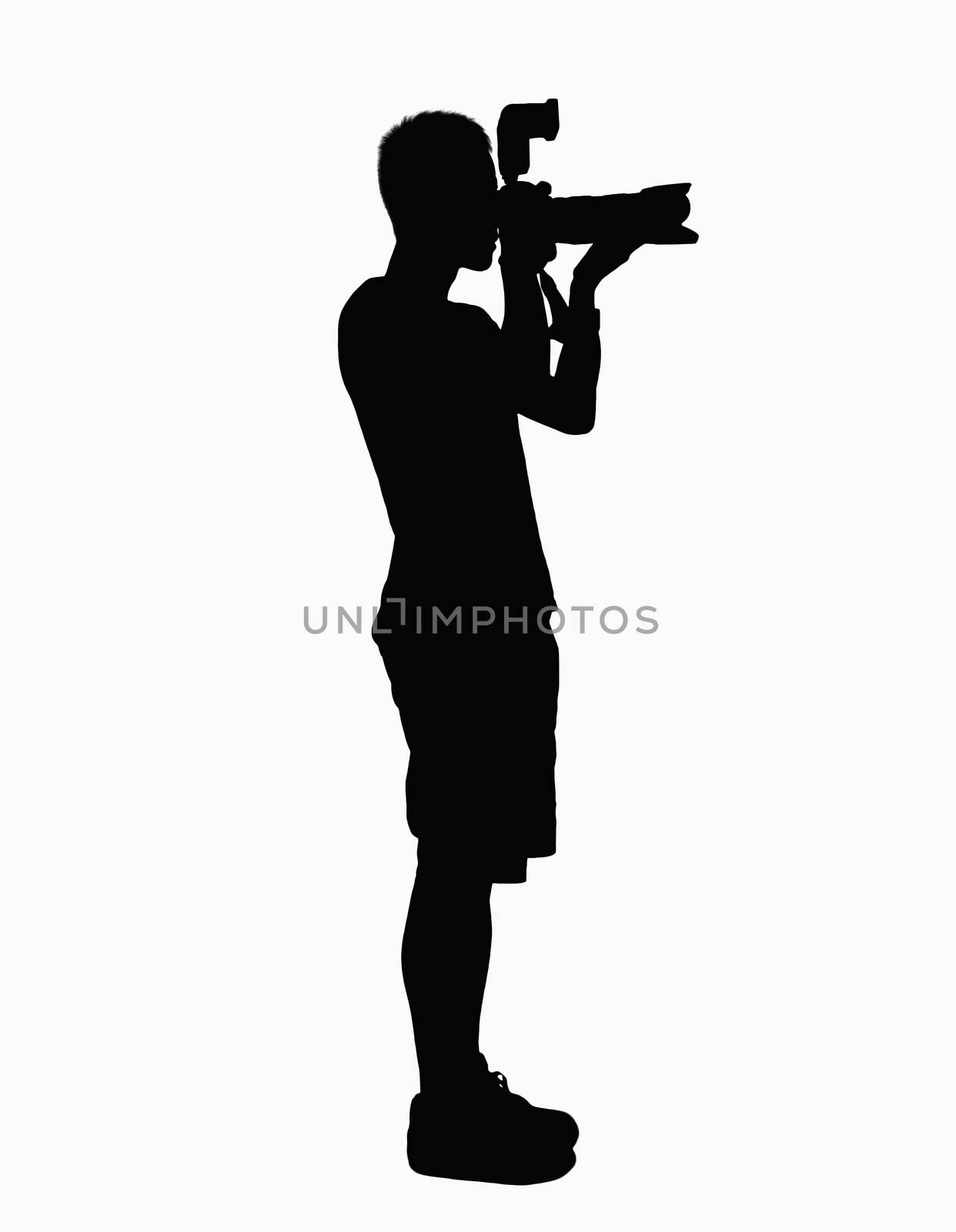 Silhouette of man holding camera.