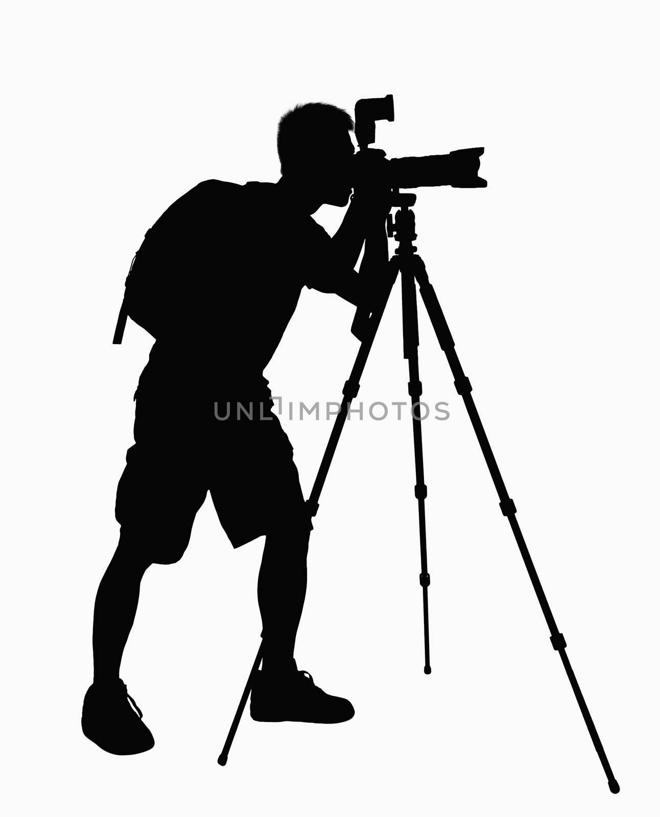 Silhouette of man taking pictures with camera on tripod.