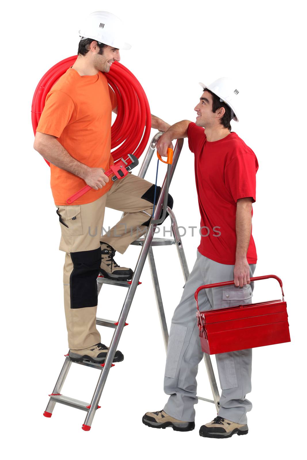 Two electricians working together