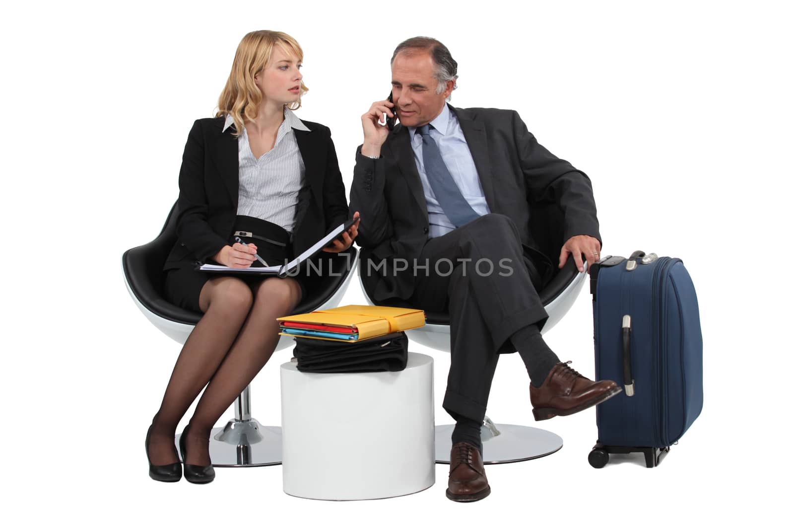 Two business people waiting by phovoir
