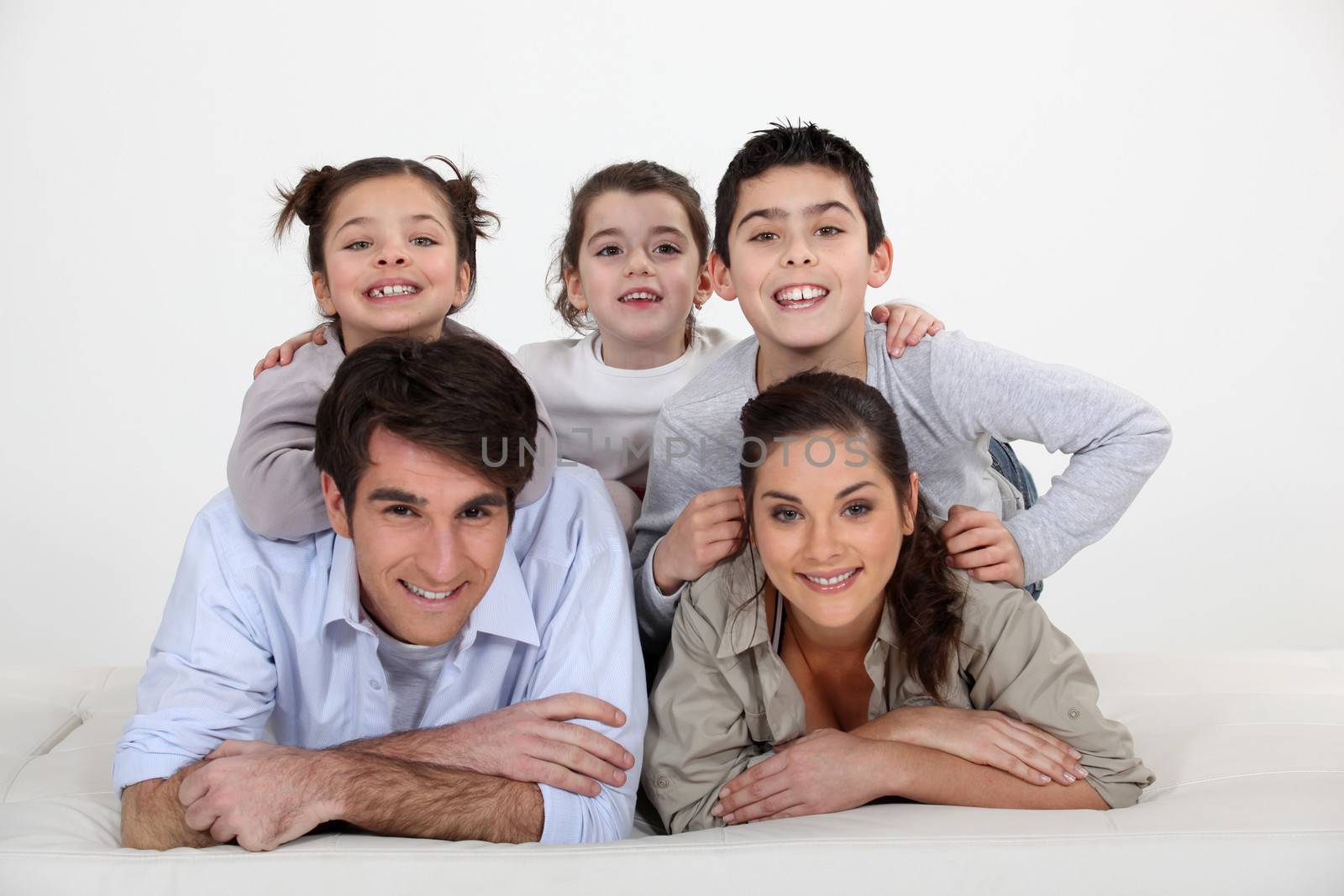 Portrait of a young family by phovoir