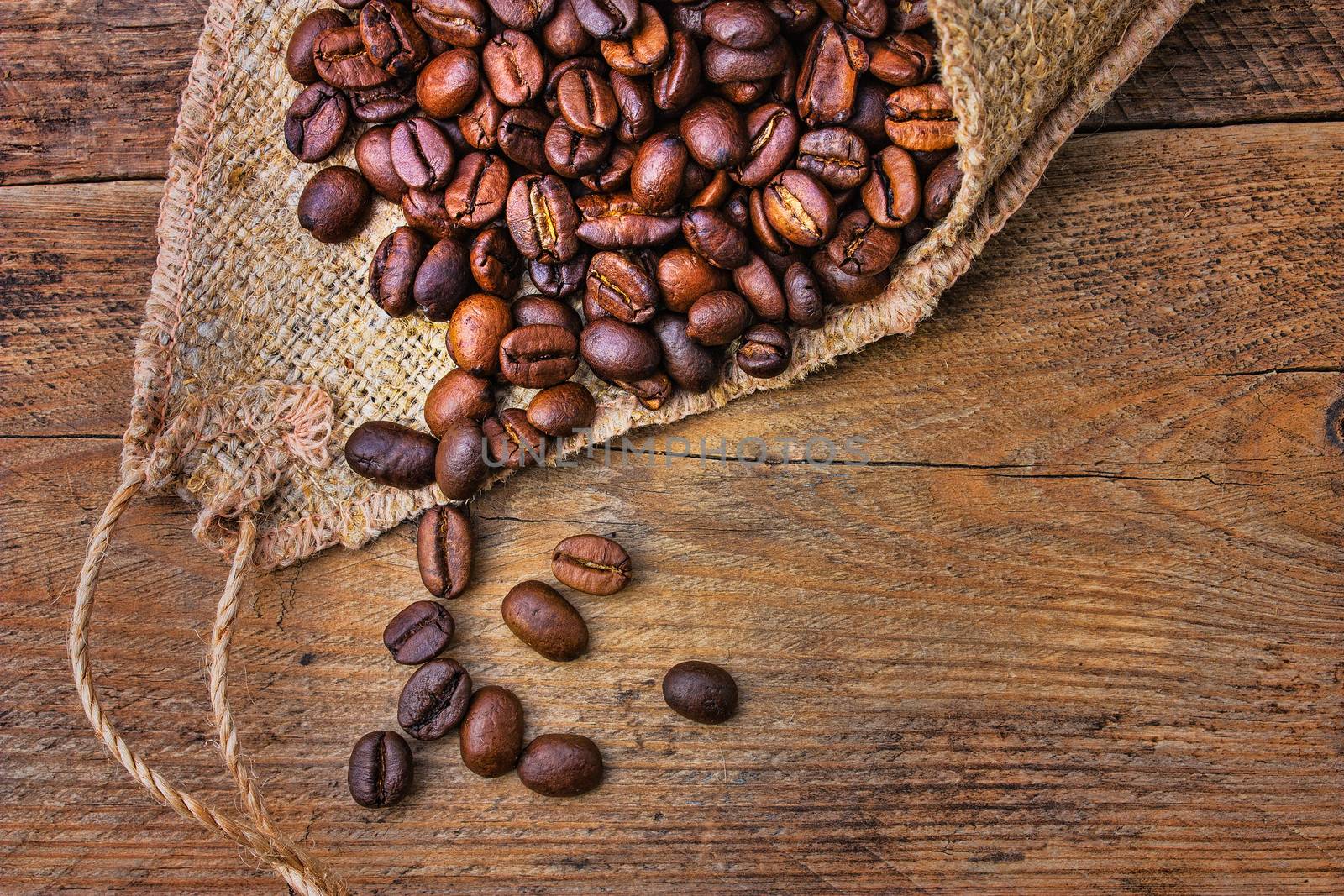 Coffee beans spilled out of the bag