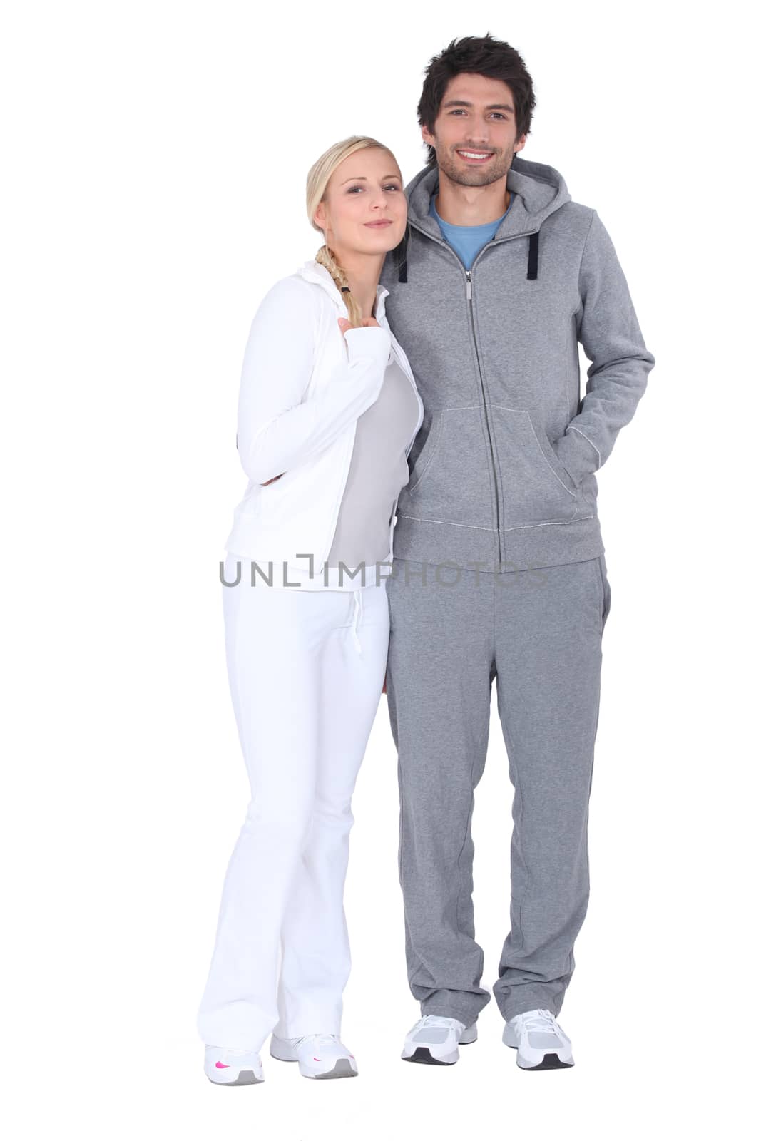 a couple wearing sport suits by phovoir