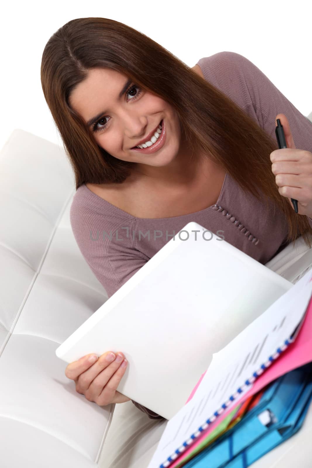 Student with a laptop by phovoir