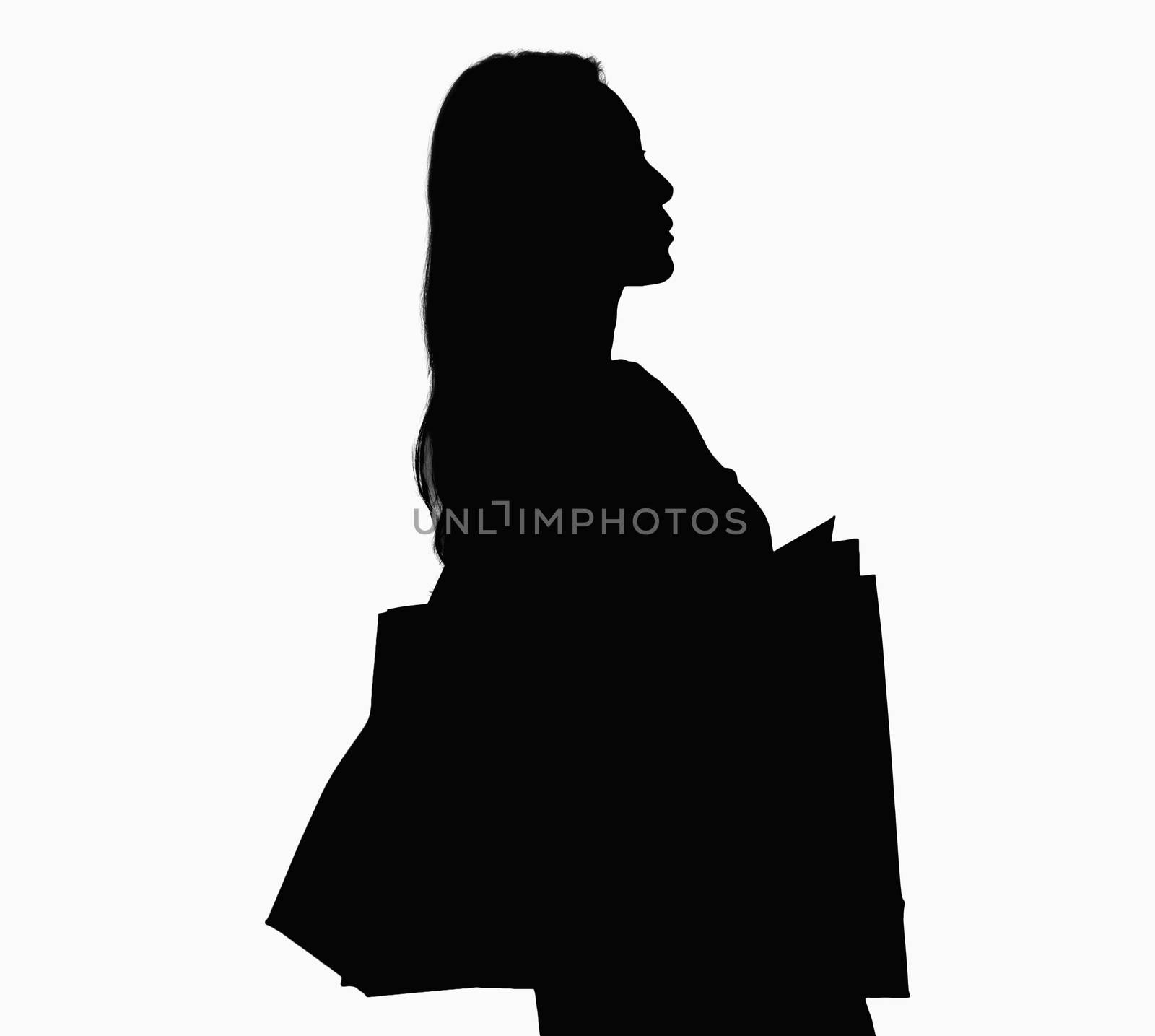 Silhouette of woman with shopping bags. by XiXinXing