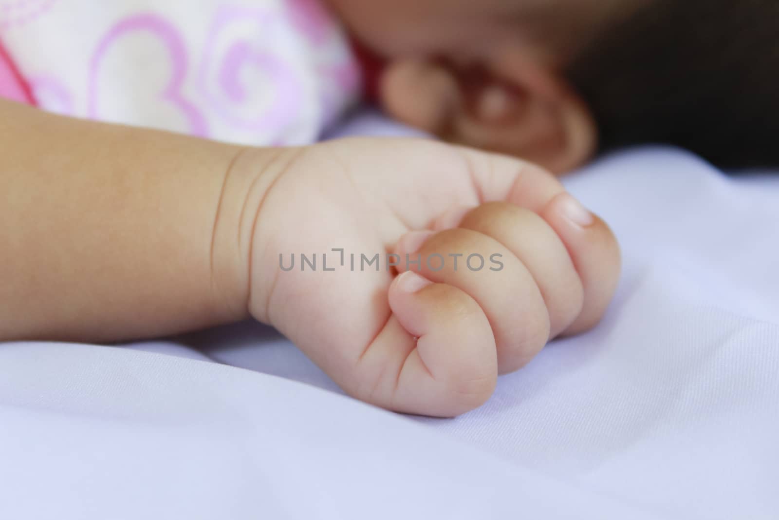 Closeup little hand of baby in sleep time