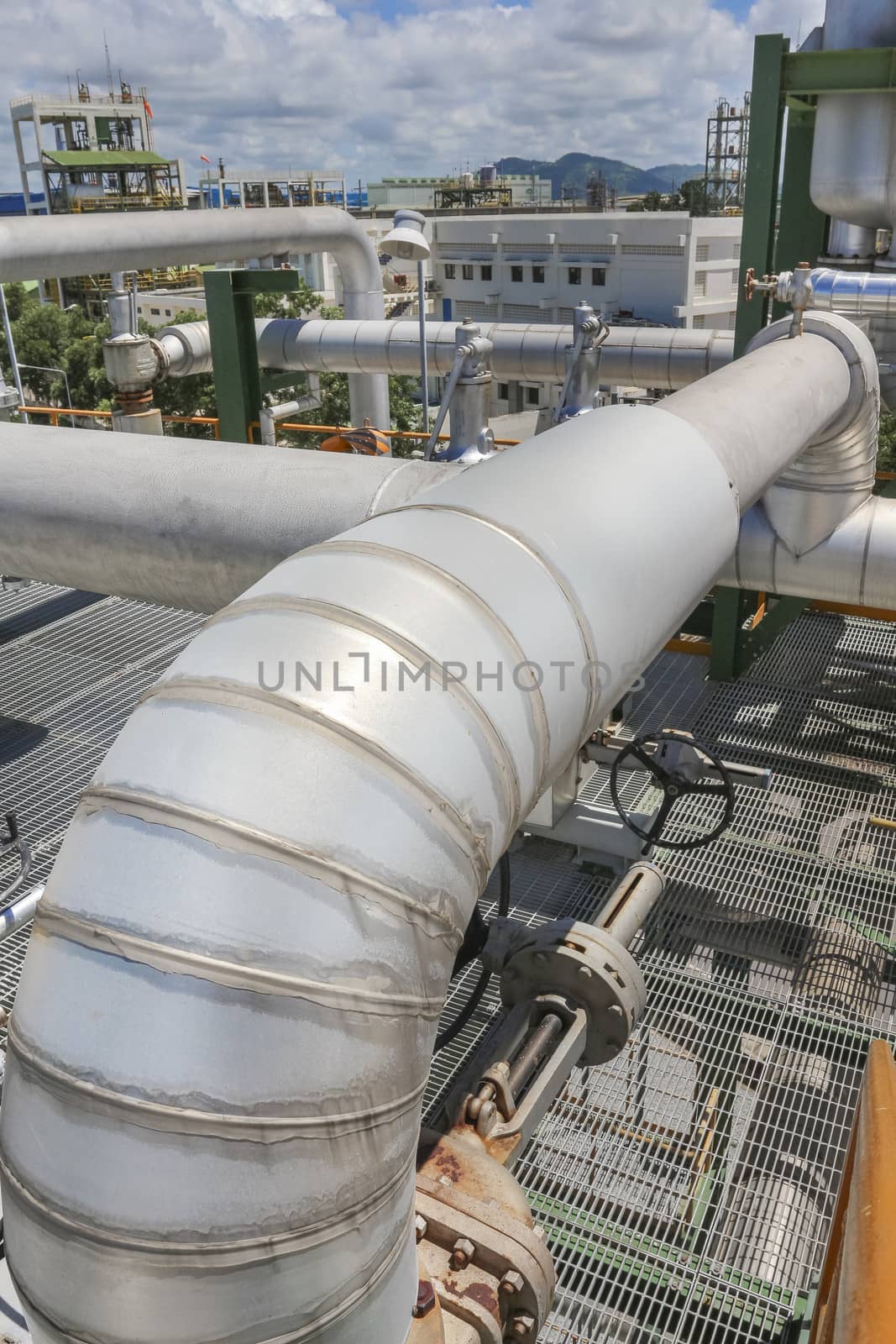 Steel pipe line with blue sky in sunny day
