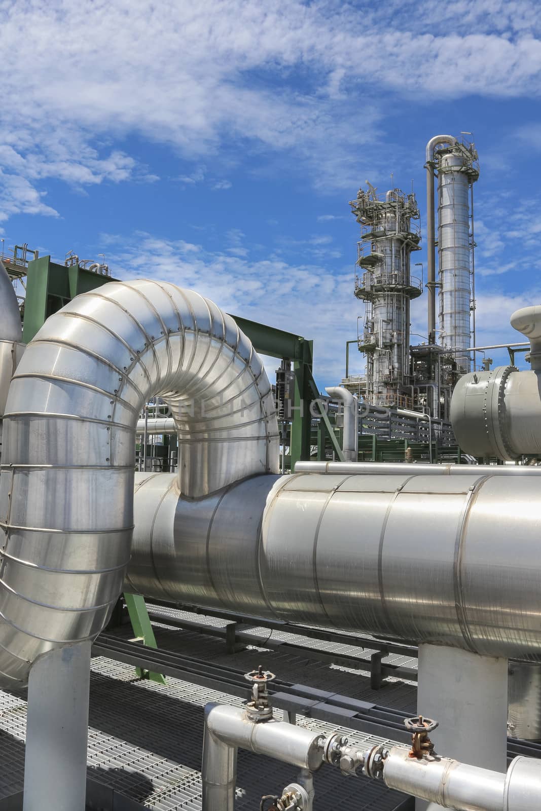 Steel pipe line with blue sky in sunny day
