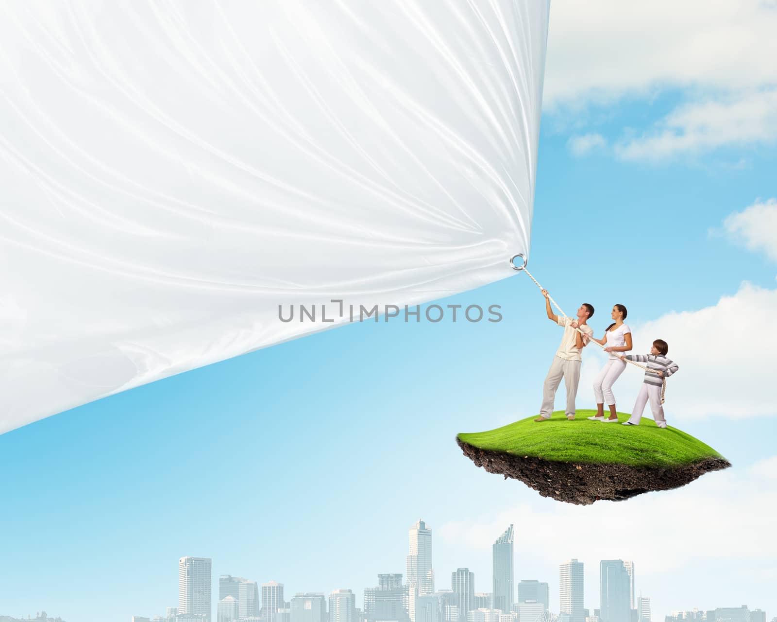 Young family pulling banner by sergey_nivens