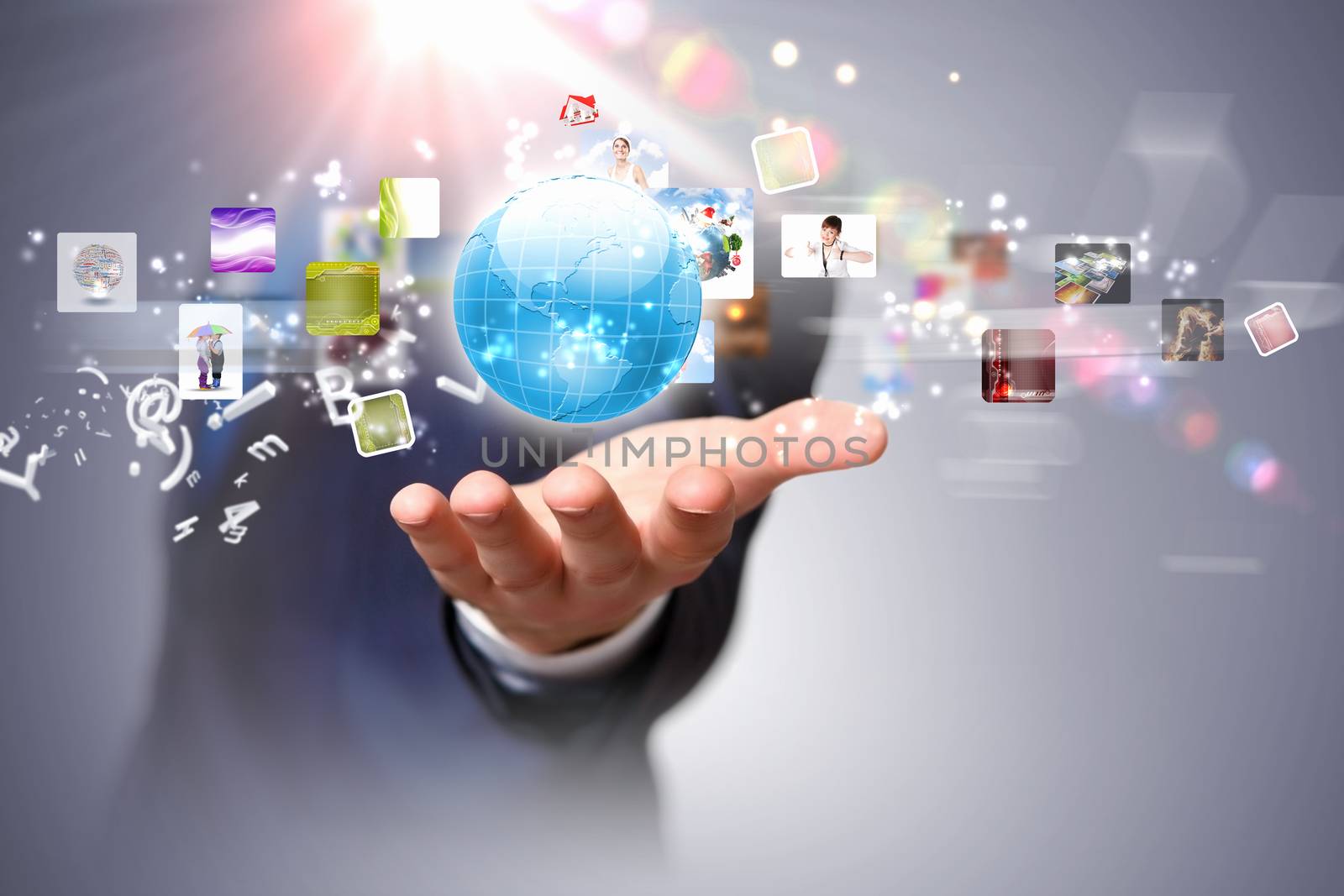 Person holding illustration of globe in hand. Media technologies