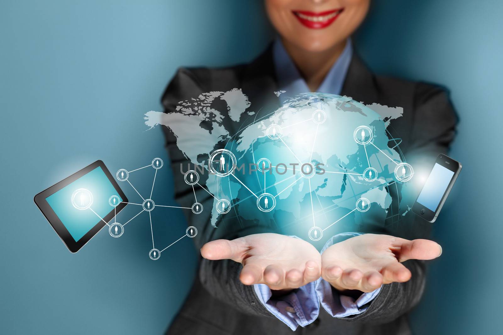 Close up image of businesswoman with 3d images of devices in her hands