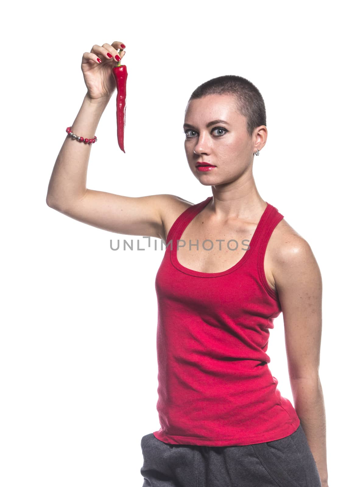 Woman with chili pepper on white background