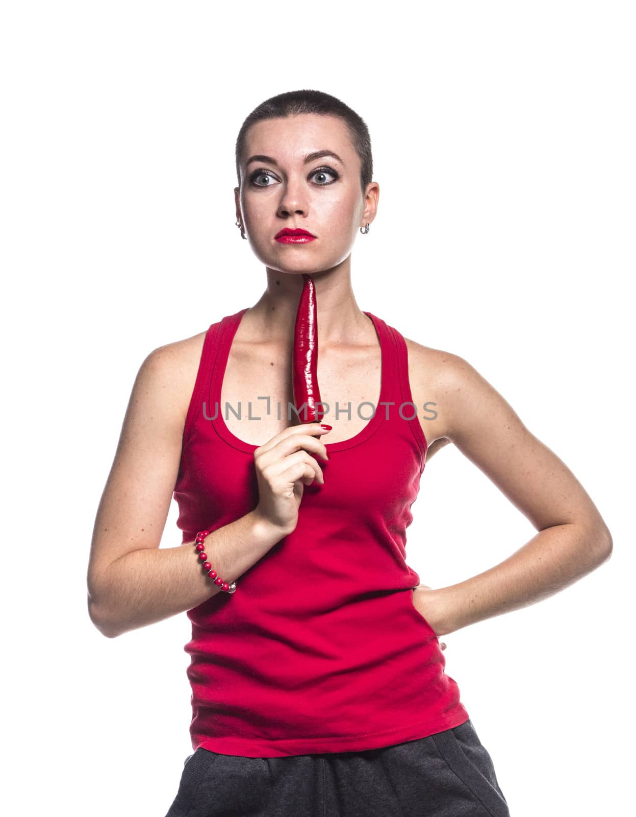 Woman with chili pepper on white background by gsdonlin