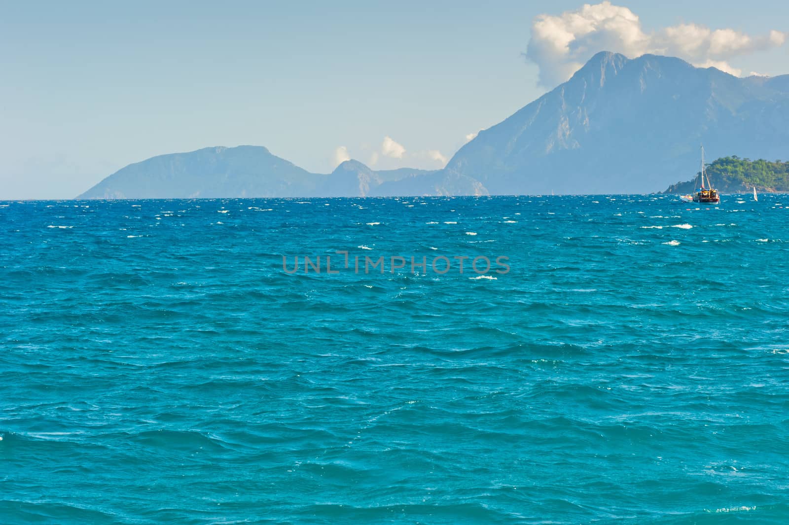 beautiful seascape with mountains in the background by kosmsos111