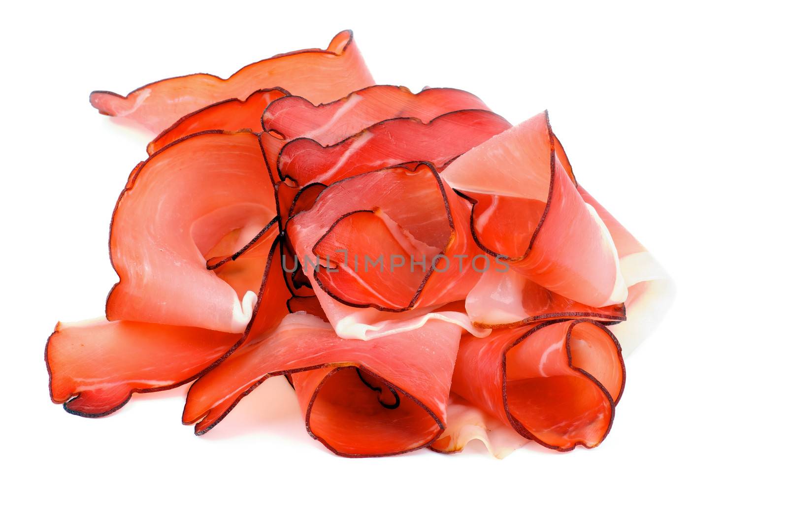 Arrangement of Delicious Smoked Ham Slices isolated on white background