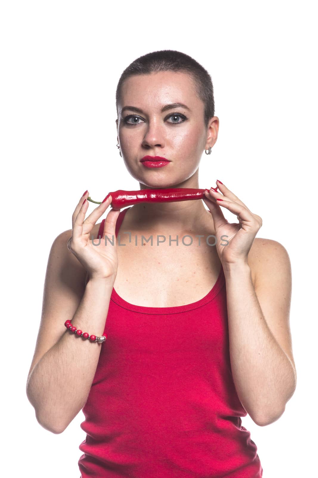 Woman with chili pepper on white background