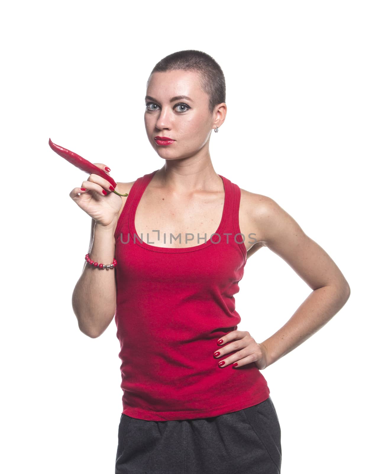 Woman with chili pepper on white background by gsdonlin