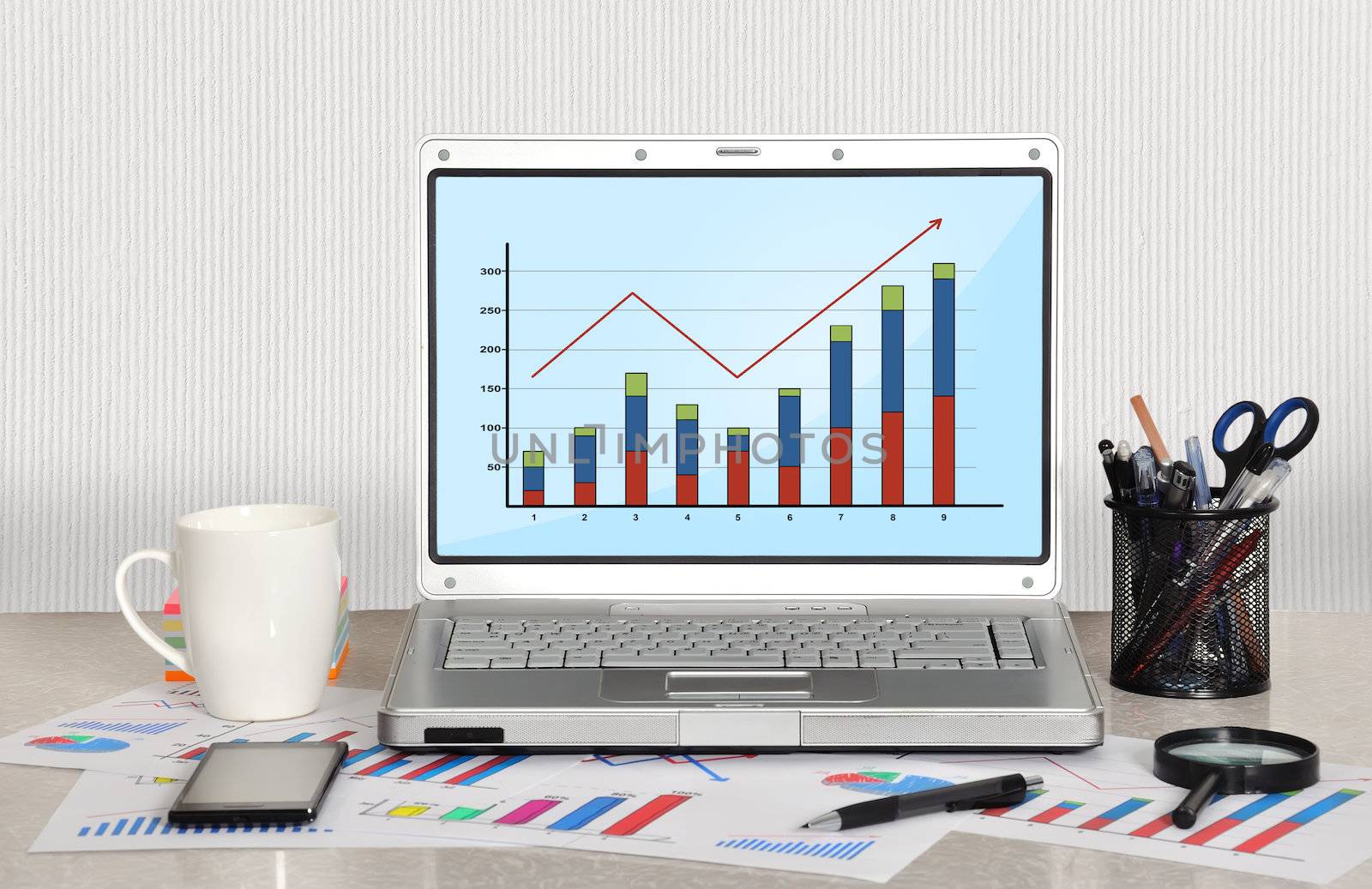 chart on screen laptop in office, closeup