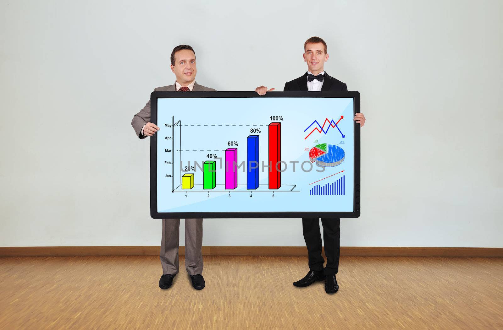 two businessman in room holding plasma panel with chart