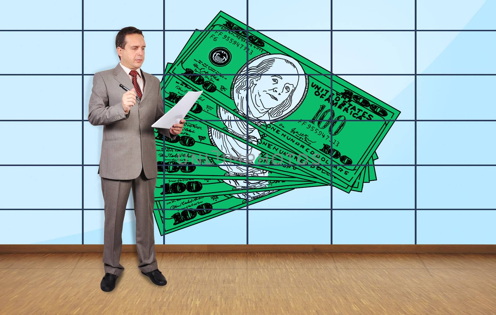 businessman in office and dollars on plasma wall