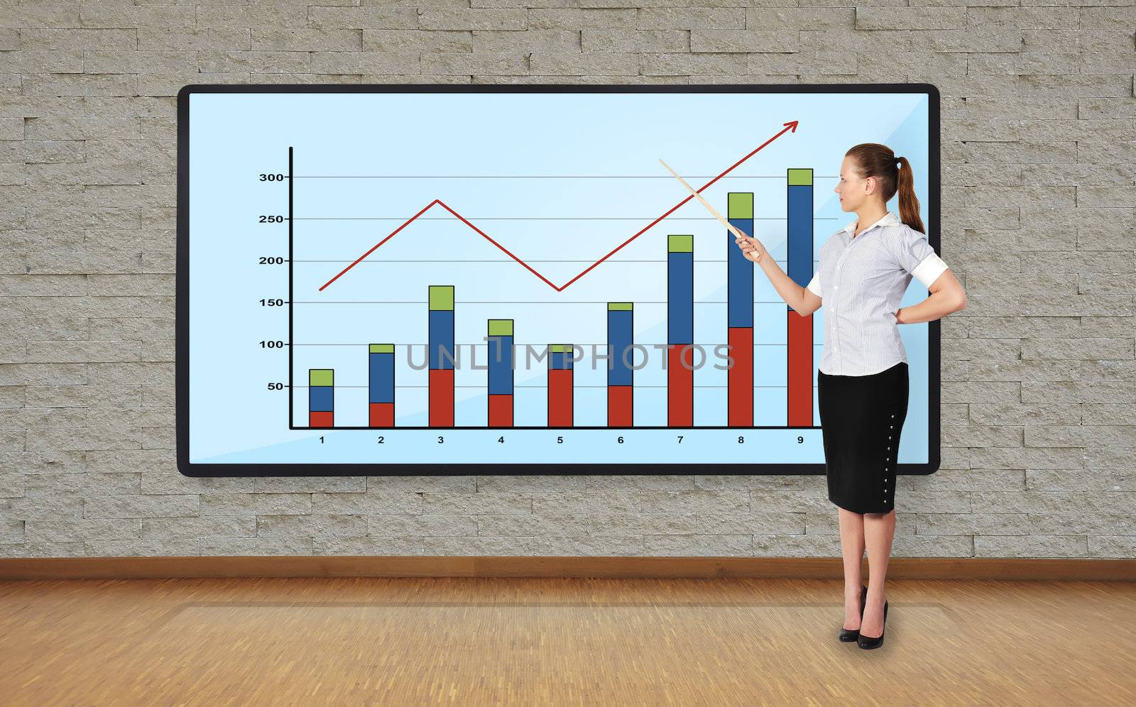 businesswoman in office pointing at plasma with chart
