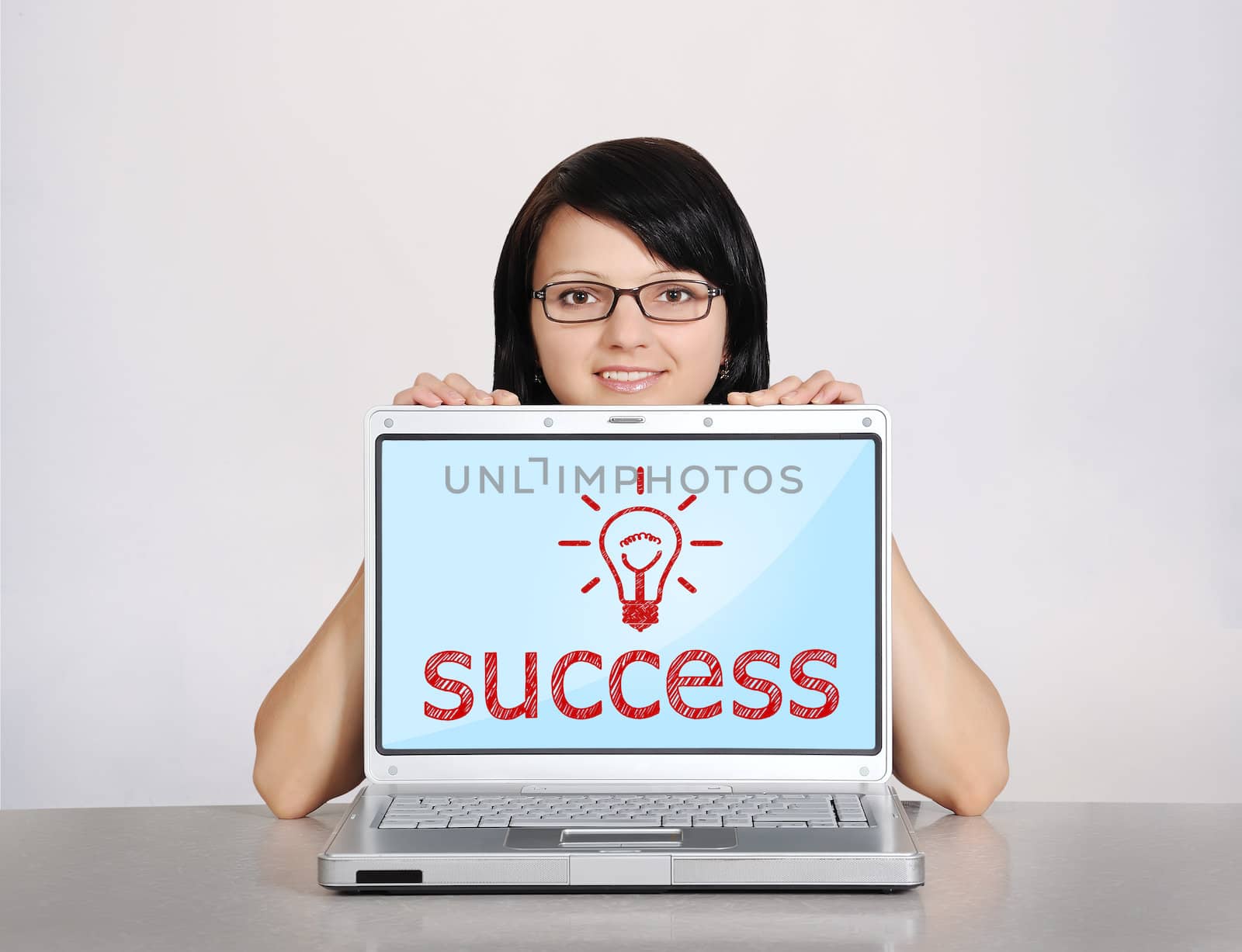 woman and notebook with success on a white background