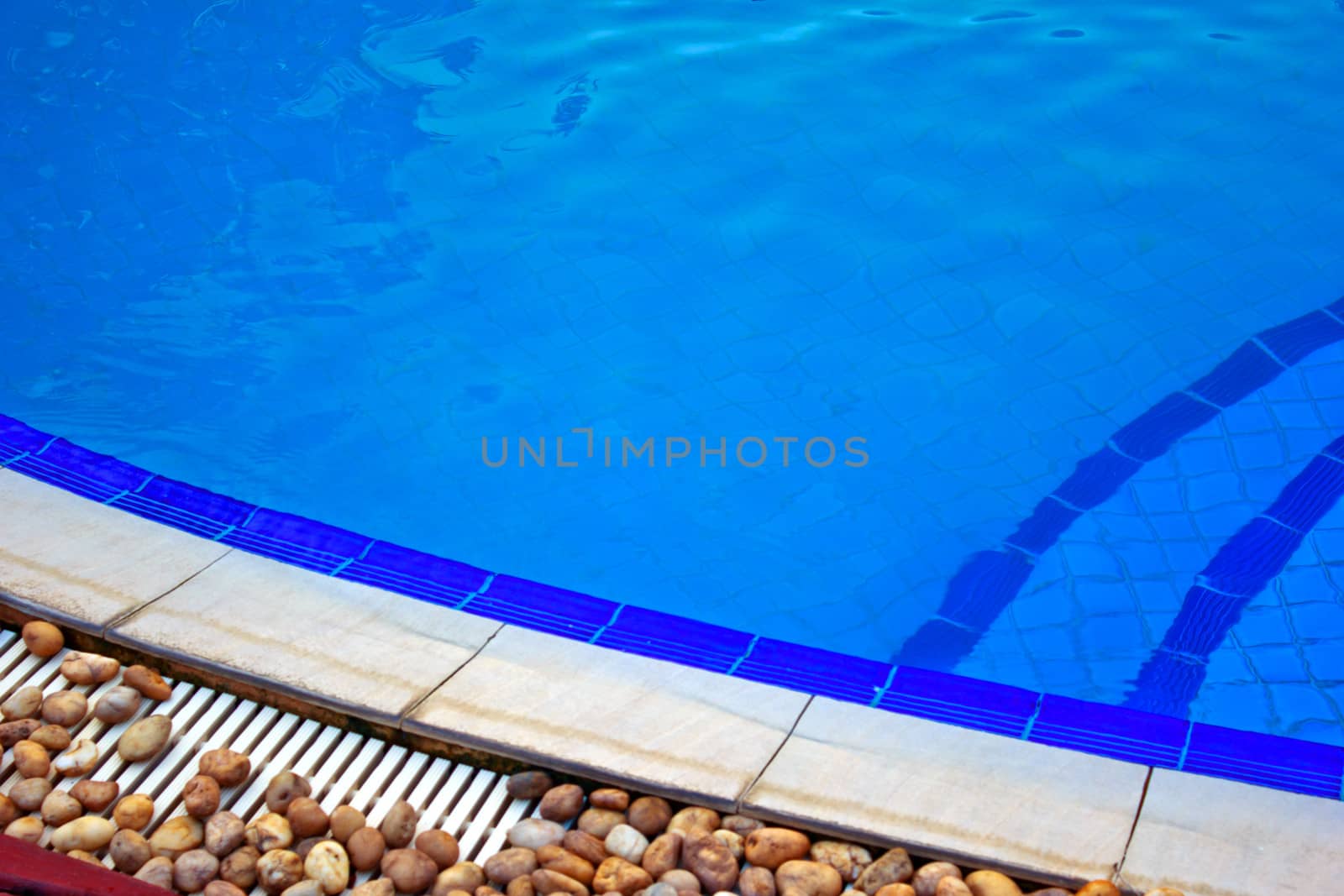 Luxury Resort Swimming Pool
high angle on curved edge of a luxury resort swimming pool