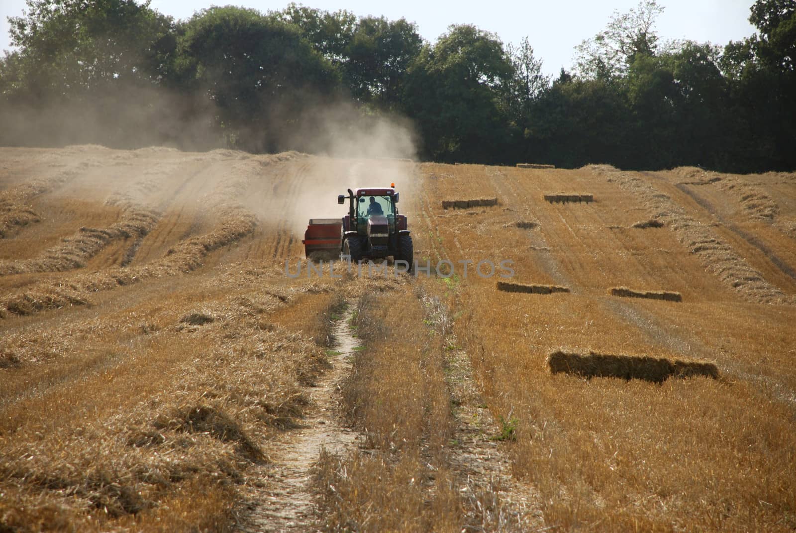 Baling straw in a field at harvest time