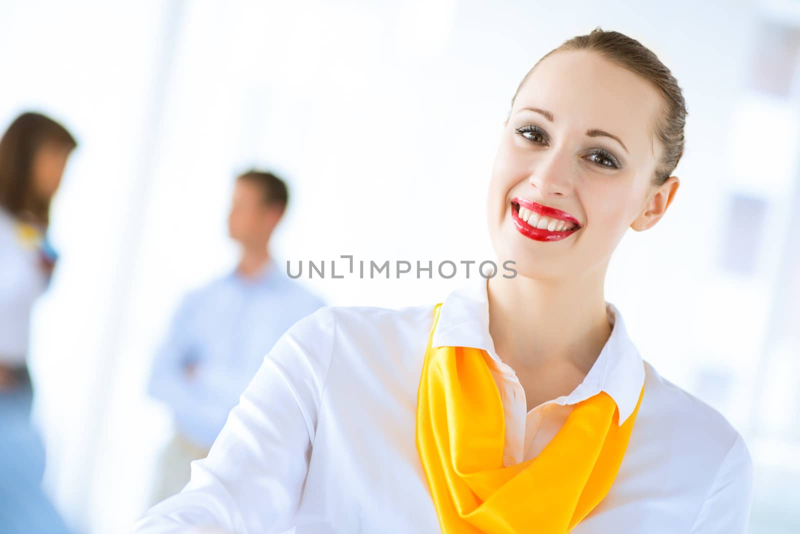 Business woman shaking hands and smiling colleague