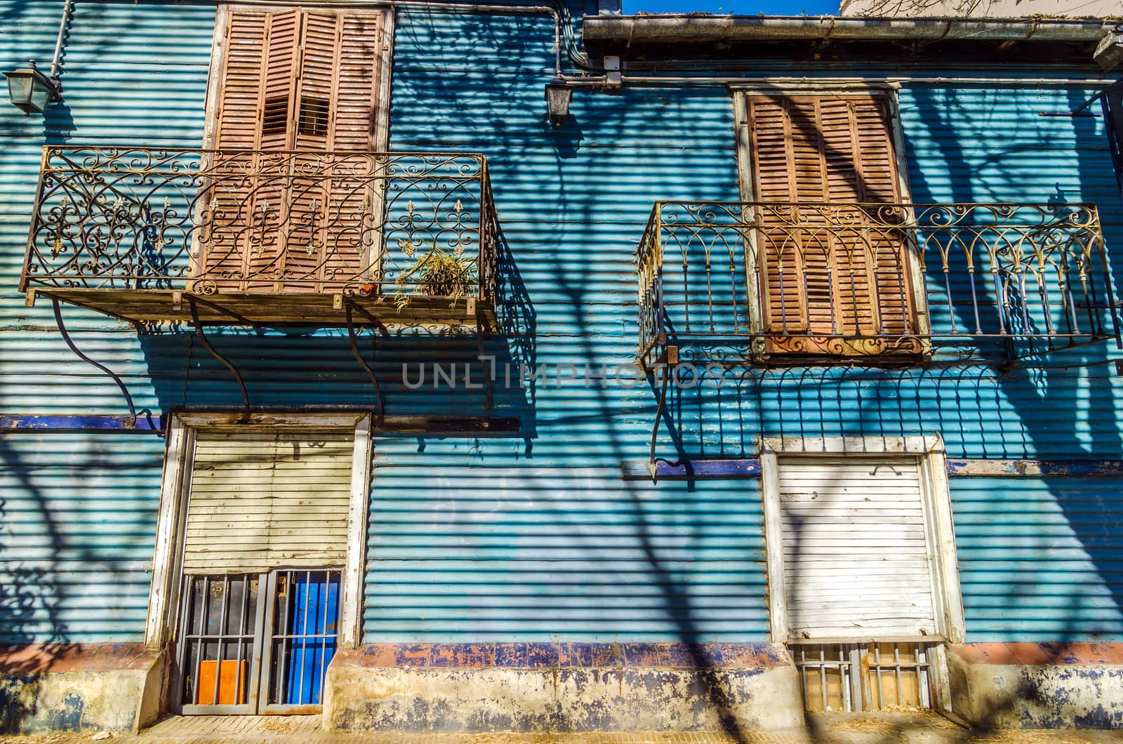 Blue corrugated siding of an old building in La Boca neighborhood of Buenos Aires, Argentina